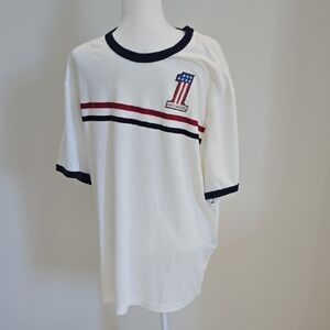 Harley-Davidson Tee. Red & Blue Strip Across Chest. Back Of Tee Is Alll White.